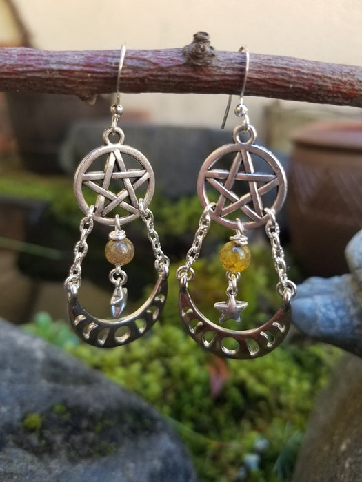 Pentacle with moonphases earrings.